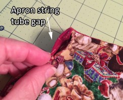 apron string tube gap