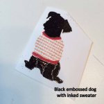 Black embossed dog with inked sweater