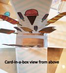 Card in a box view from above