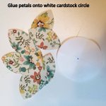 Glue petals to white cardstock circle